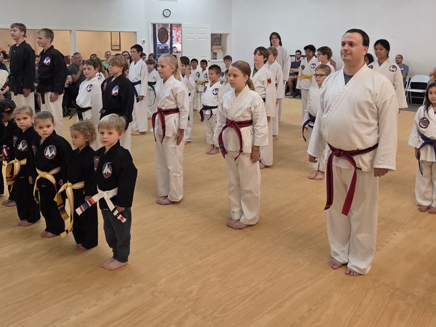 Students of all ages lined up in uniform at Bares Taekwondo Fitness in Tyler, TX